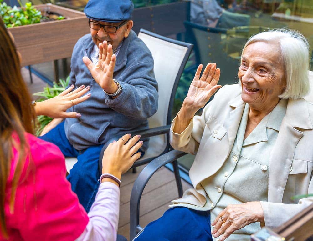 Seniors having fun with nurse
