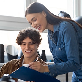 Man and woman with paperwork