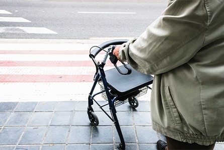 Close up of a man with a walker