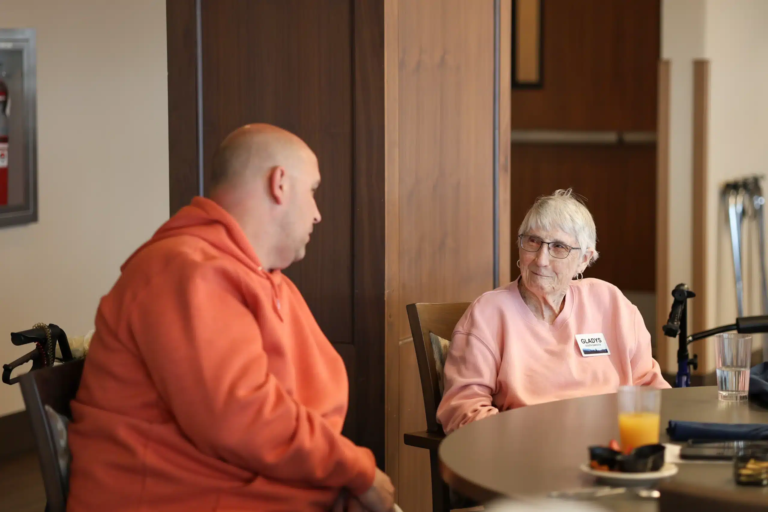 Man and woman talking at the breakfast table