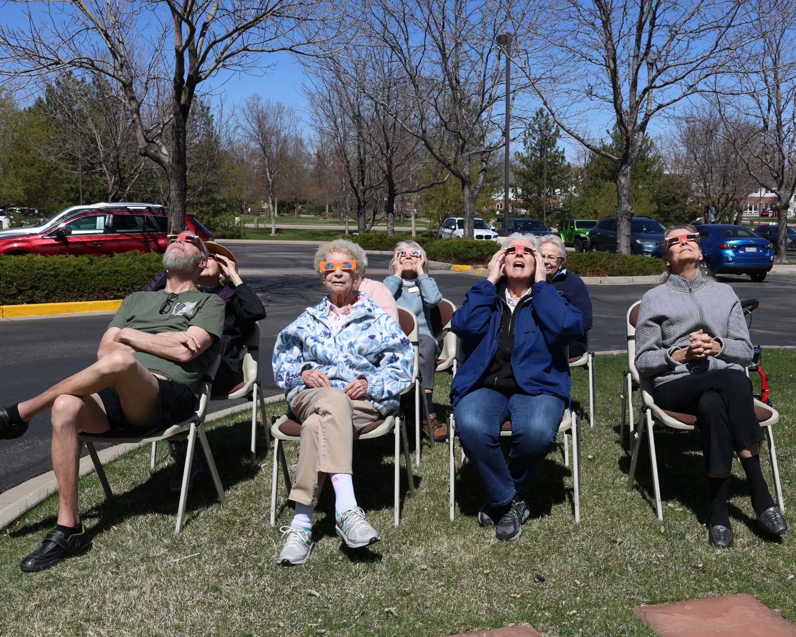 People outside watching eclipse
