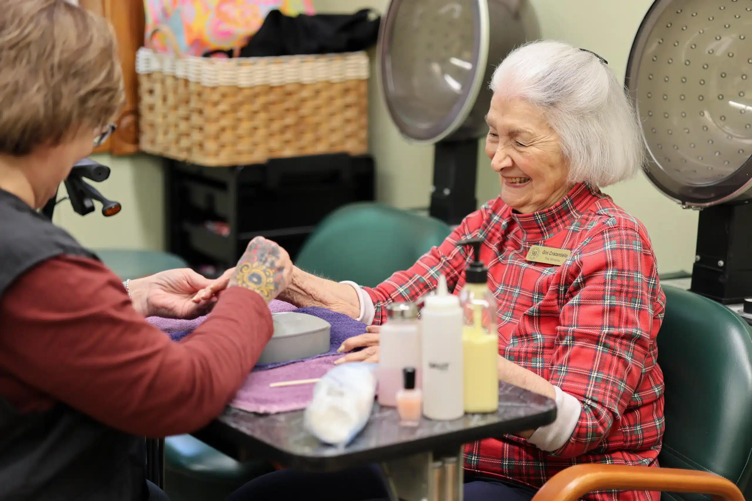 Senior getting manicure