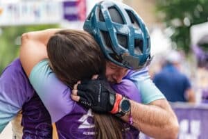 Andrew hugs his sister after the Ride to End Alz 2025