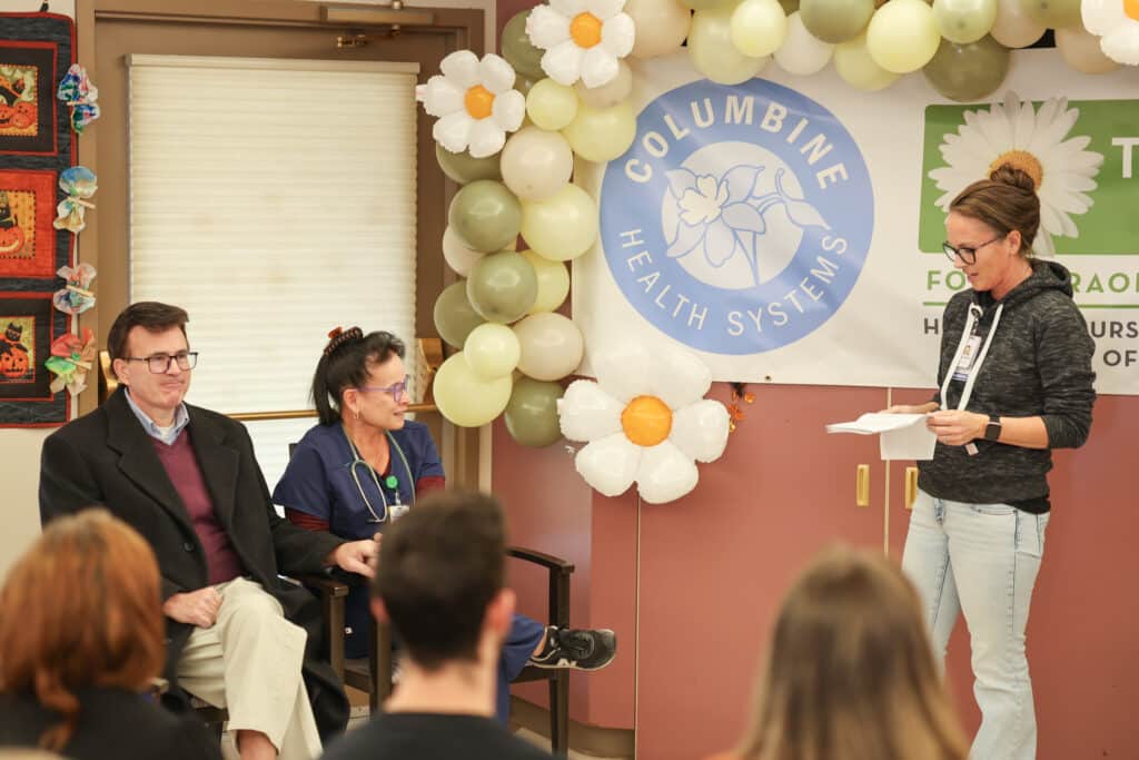 Chelsea Peterson reading the nomination letter